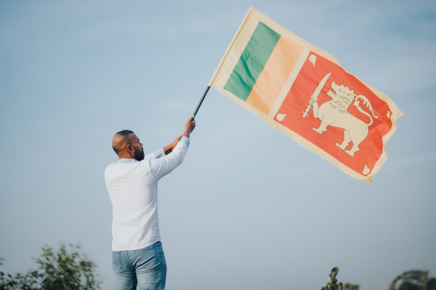 Man Waving Sri Lanka National Flag Sinha Kodiya Jathika Kodiya  (21)