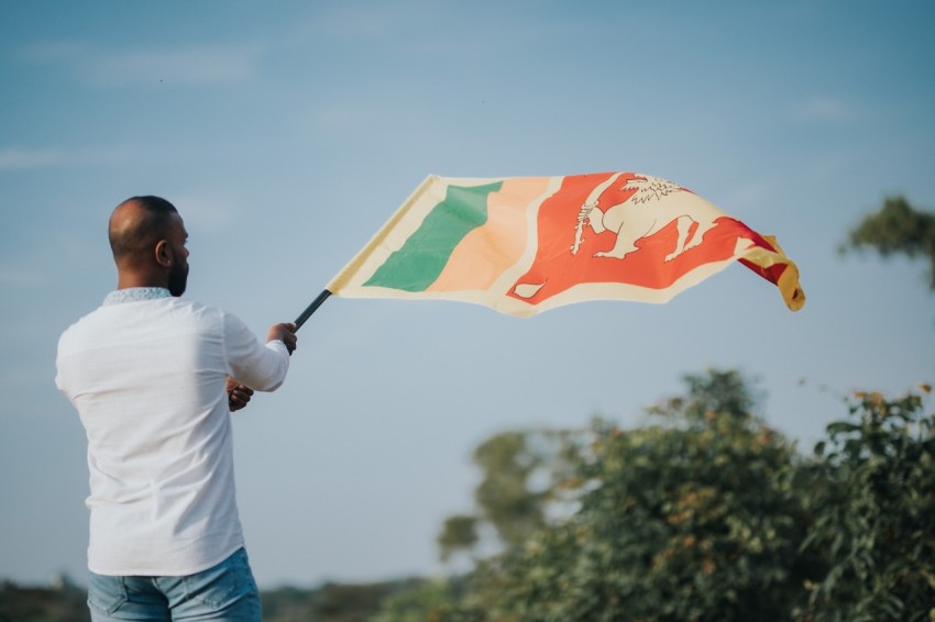 Man Waving Sri Lanka National Flag Sinha Kodiya Jathika Kodiya  (8)