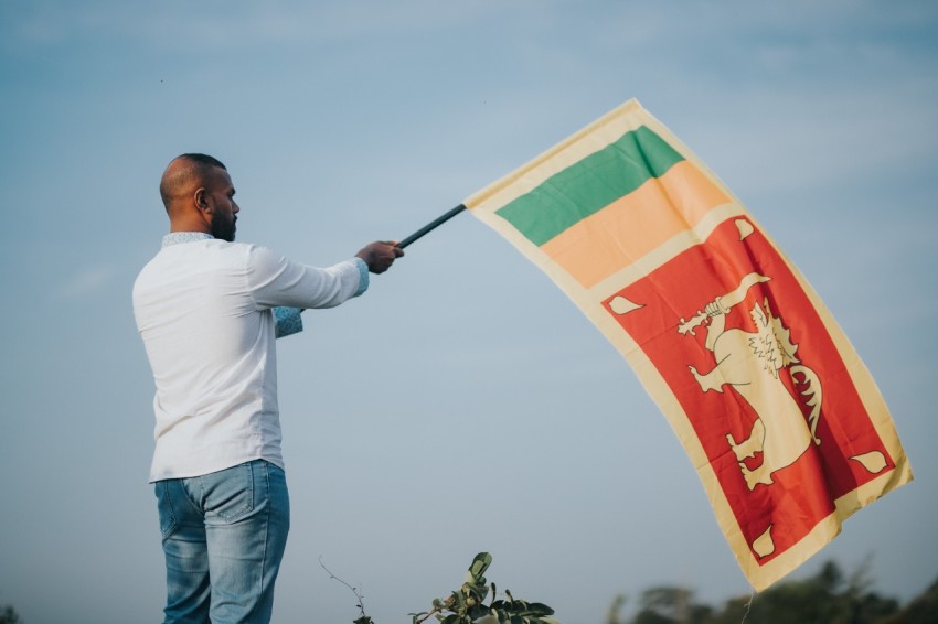 Man Waving Sri Lanka National Flag Sinha Kodiya Jathika Kodiya  (13)