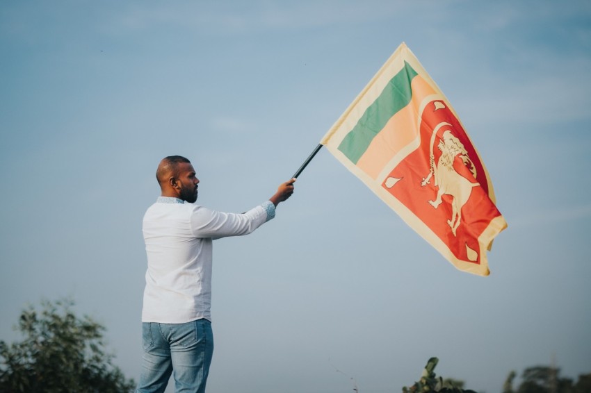 Man Waving Sri Lanka National Flag Sinha Kodiya Jathika Kodiya  (14)