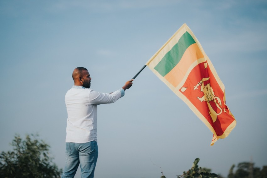 Man Waving Sri Lanka National Flag Sinha Kodiya Jathika Kodiya  (15)