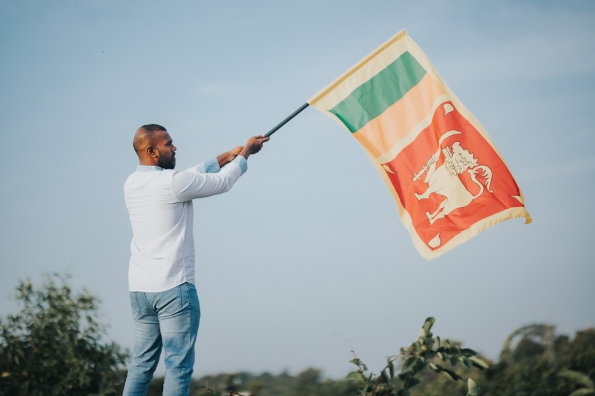 Man Waving Sri Lanka National Flag Sinha Kodiya Jathika Kodiya  (18)
