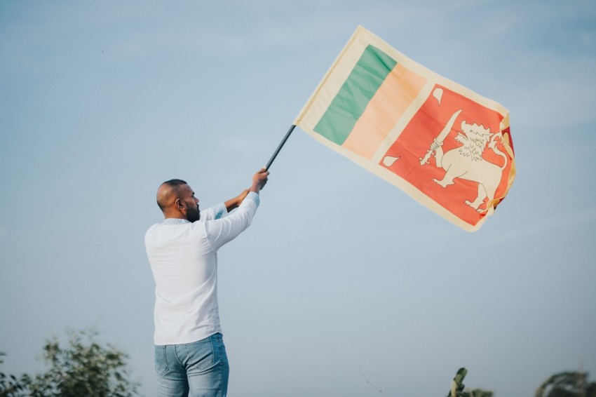 Man Waving Sri Lanka National Flag Sinha Kodiya Jathika Kodiya  (20)
