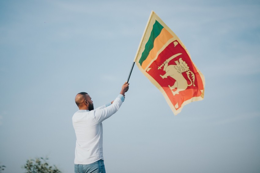 Man Waving Sri Lanka National Flag Sinha Kodiya Jathika Kodiya  (25)