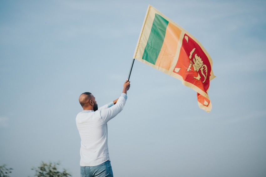 Man Waving Sri Lanka National Flag Sinha Kodiya Jathika Kodiya  (24)