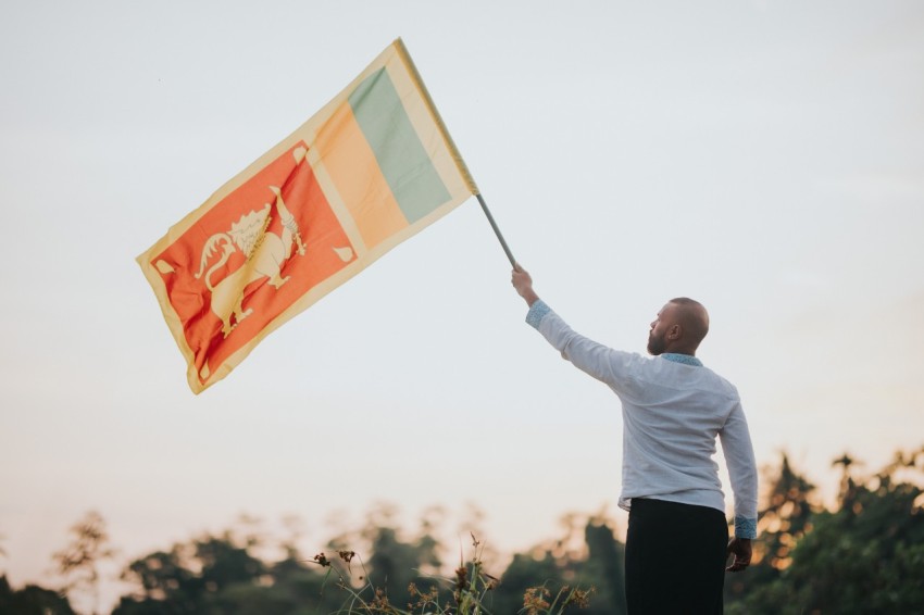 Man Waving Sri Lanka National Flag Sinha Kodiya Jathika Kodiya  (100)