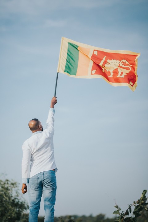 Man Waving Sri Lanka National Flag Sinha Kodiya Jathika Kodiya  (27)