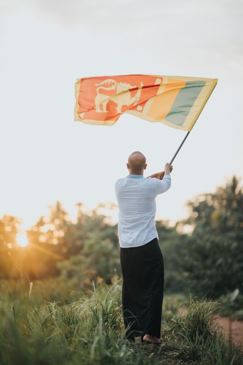 Man Waving Sri Lanka National Flag Sinha Kodiya Jathika Kodiya  (52)
