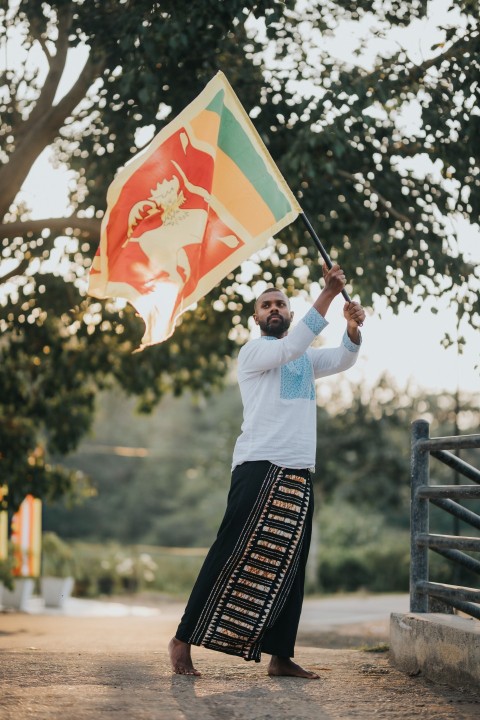 Man Waving Sri Lanka National Flag Sinha Kodiya Jathika Kodiya  (41)