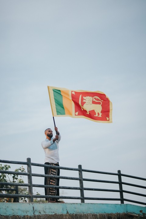 Man Waving Sri Lanka National Flag Sinha Kodiya Jathika Kodiya  (35)