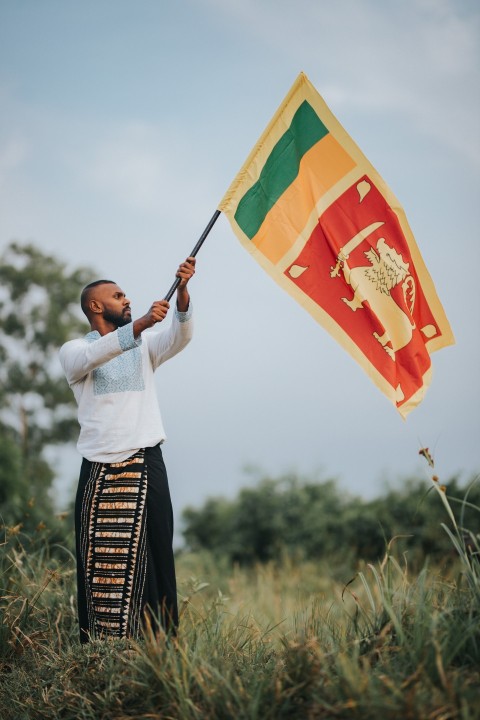 Man Waving Sri Lanka National Flag Sinha Kodiya Jathika Kodiya  (108)