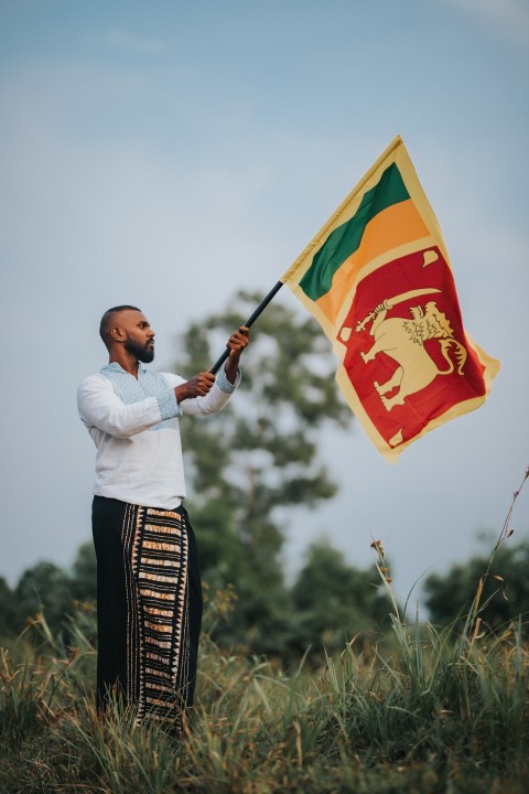 Man Waving Sri Lanka National Flag Sinha Kodiya Jathika Kodiya  (115)