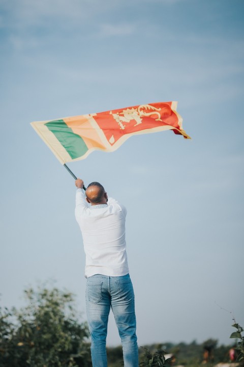 Man Waving Sri Lanka National Flag Sinha Kodiya Jathika Kodiya  (29)
