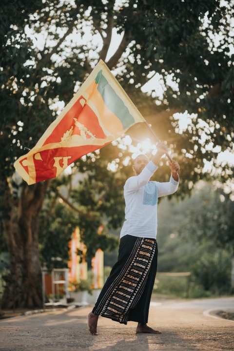 Man Waving Sri Lanka National Flag Sinha Kodiya Jathika Kodiya  (38)