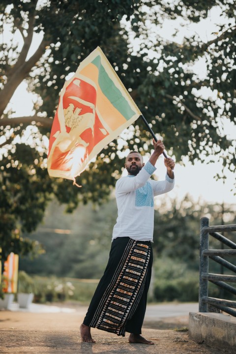 Man Waving Sri Lanka National Flag Sinha Kodiya Jathika Kodiya  (40)