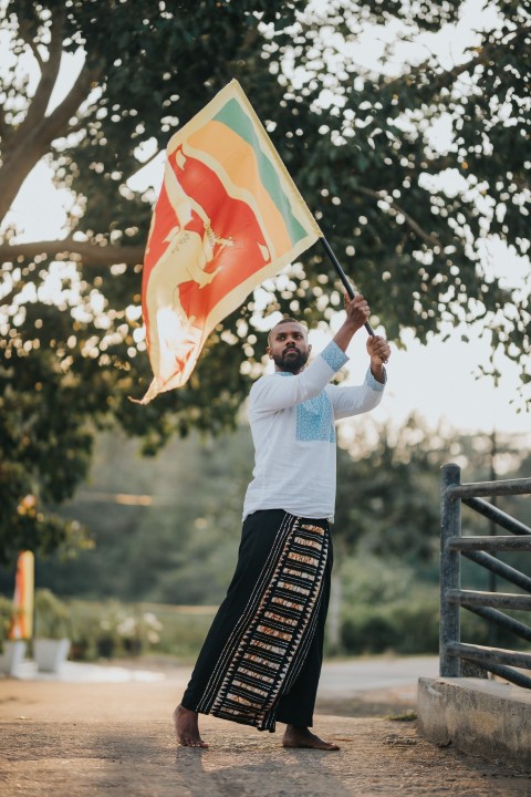 Man Waving Sri Lanka National Flag Sinha Kodiya Jathika Kodiya  (43)