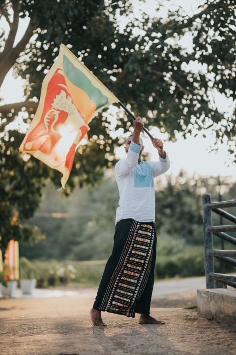 Man Waving Sri Lanka National Flag Sinha Kodiya Jathika Kodiya  (44)