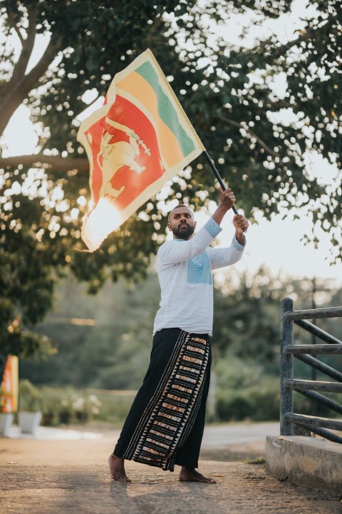 Man Waving Sri Lanka National Flag Sinha Kodiya Jathika Kodiya  (42)