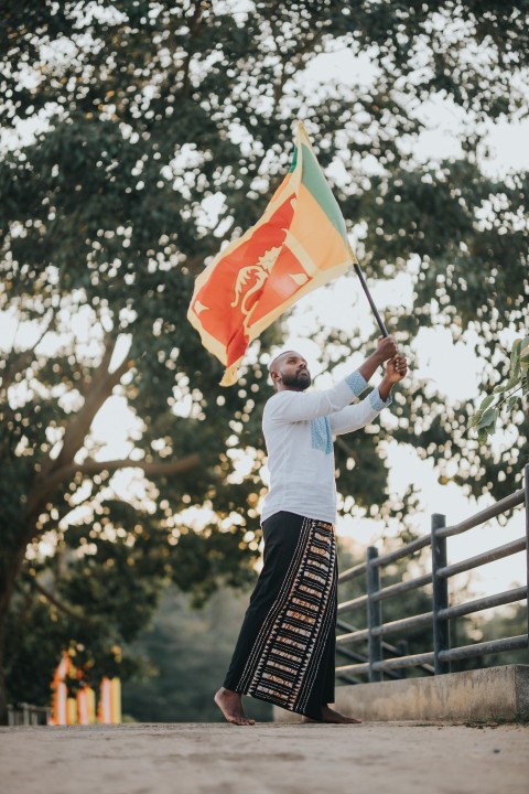Man Waving Sri Lanka National Flag Sinha Kodiya Jathika Kodiya  (49)