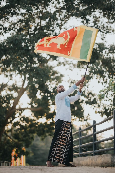 Man Waving Sri Lanka National Flag Sinha Kodiya Jathika Kodiya  (48)