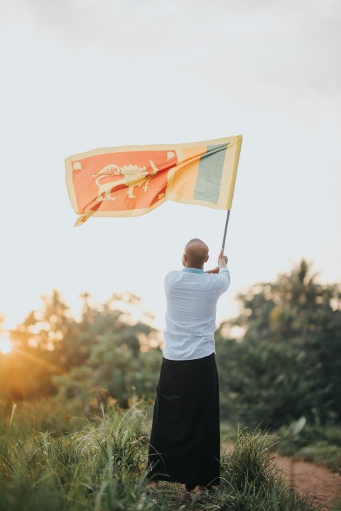 Man Waving Sri Lanka National Flag Sinha Kodiya Jathika Kodiya  (55)