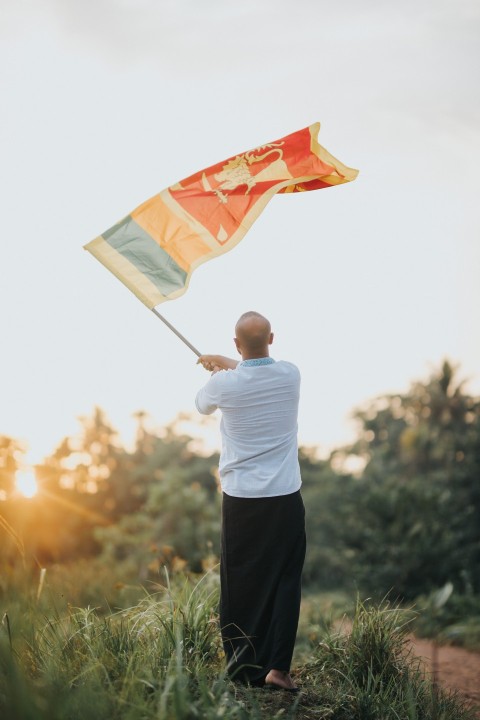 Man Waving Sri Lanka National Flag Sinha Kodiya Jathika Kodiya  (53)