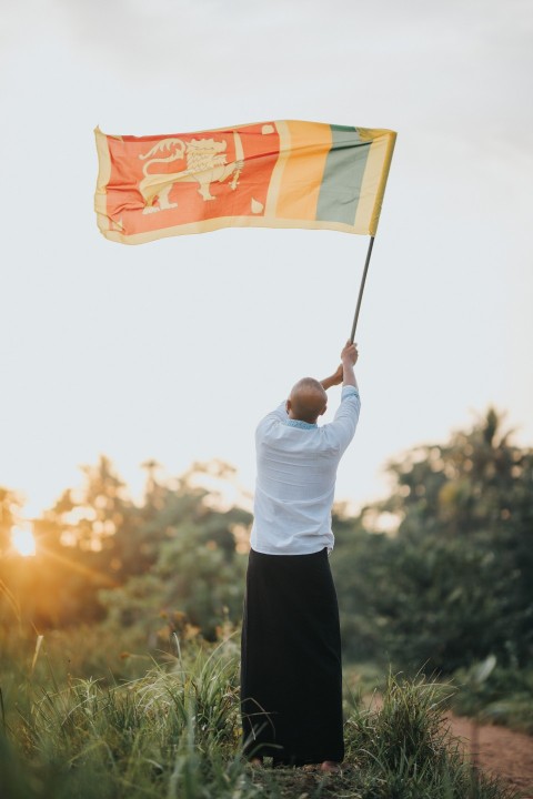 Man Waving Sri Lanka National Flag Sinha Kodiya Jathika Kodiya  (57)