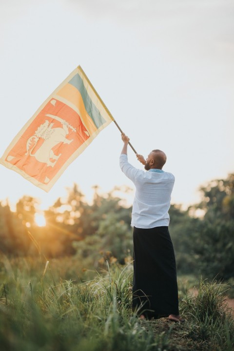 Man Waving Sri Lanka National Flag Sinha Kodiya Jathika Kodiya  (61)