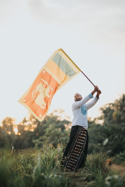 Man Waving Sri Lanka National Flag Sinha Kodiya Jathika Kodiya  (64)