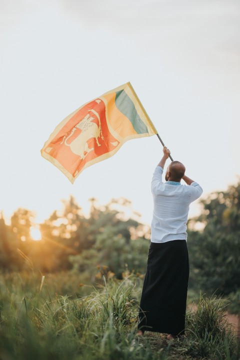Man Waving Sri Lanka National Flag Sinha Kodiya Jathika Kodiya  (63)
