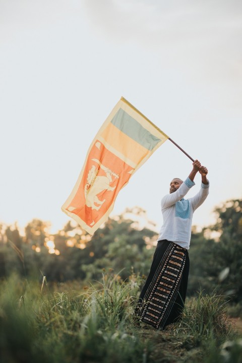 Man Waving Sri Lanka National Flag Sinha Kodiya Jathika Kodiya  (67)
