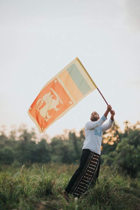 Man Waving Sri Lanka National Flag Sinha Kodiya Jathika Kodiya  (69)