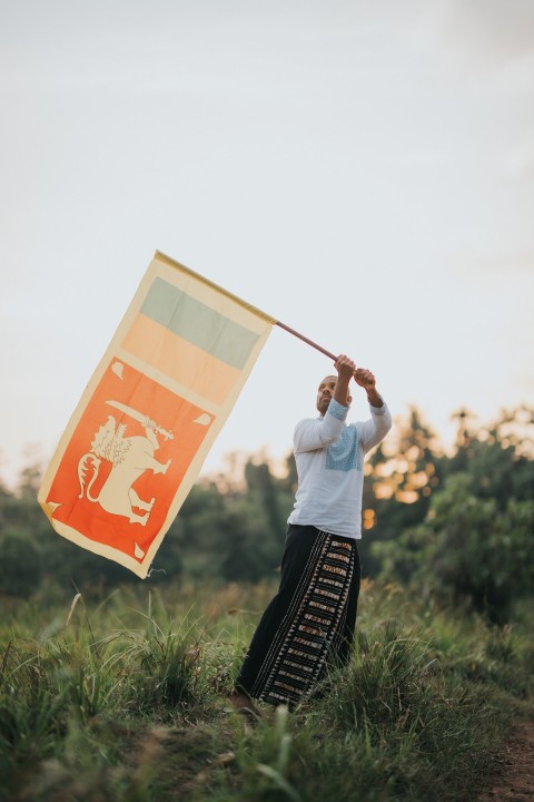 Man Waving Sri Lanka National Flag Sinha Kodiya Jathika Kodiya  (70)