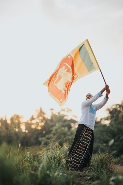 Man Waving Sri Lanka National Flag Sinha Kodiya Jathika Kodiya  (68)