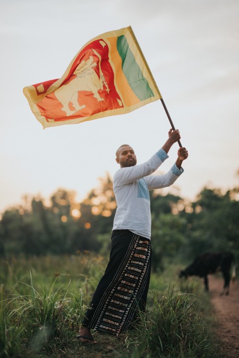 Man Waving Sri Lanka National Flag Sinha Kodiya Jathika Kodiya  (73)