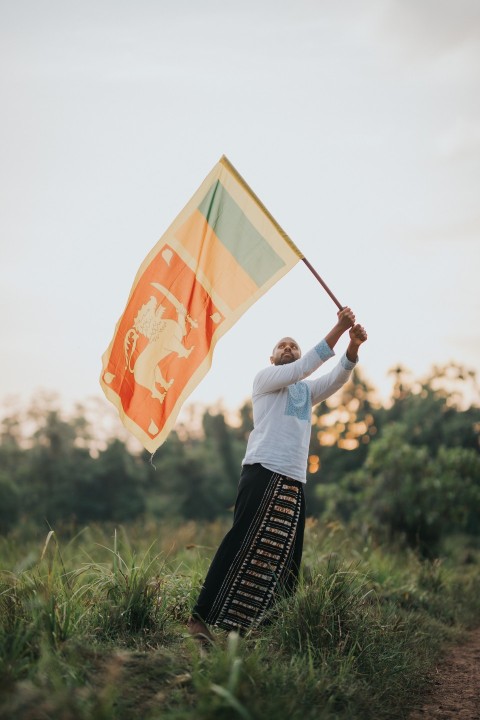Man Waving Sri Lanka National Flag Sinha Kodiya Jathika Kodiya  (72)