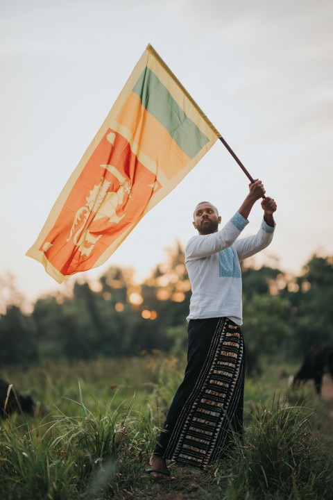 Man Waving Sri Lanka National Flag Sinha Kodiya Jathika Kodiya  (76)