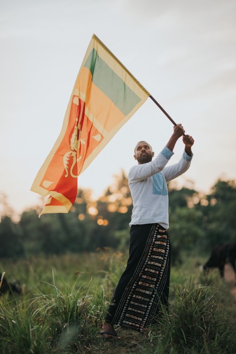 Man Waving Sri Lanka National Flag Sinha Kodiya Jathika Kodiya  (75)