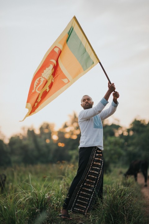 Man Waving Sri Lanka National Flag Sinha Kodiya Jathika Kodiya  (79)