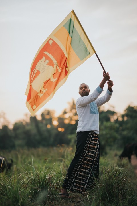 Man Waving Sri Lanka National Flag Sinha Kodiya Jathika Kodiya  (78)