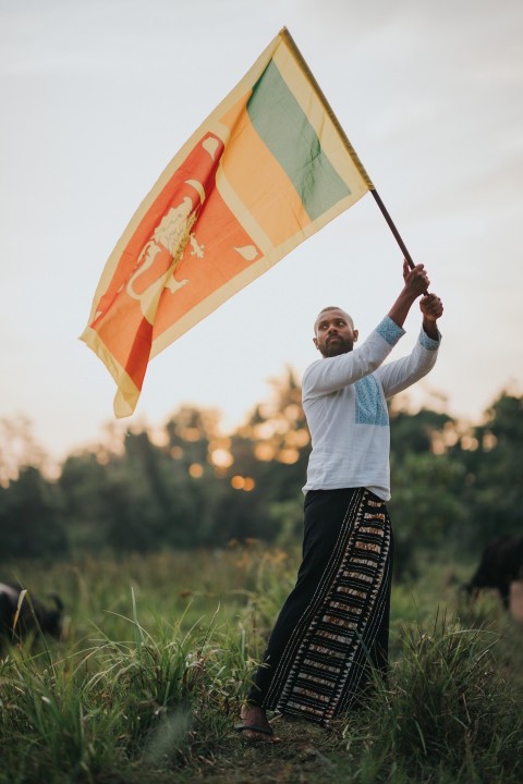 Man Waving Sri Lanka National Flag Sinha Kodiya Jathika Kodiya  (77)