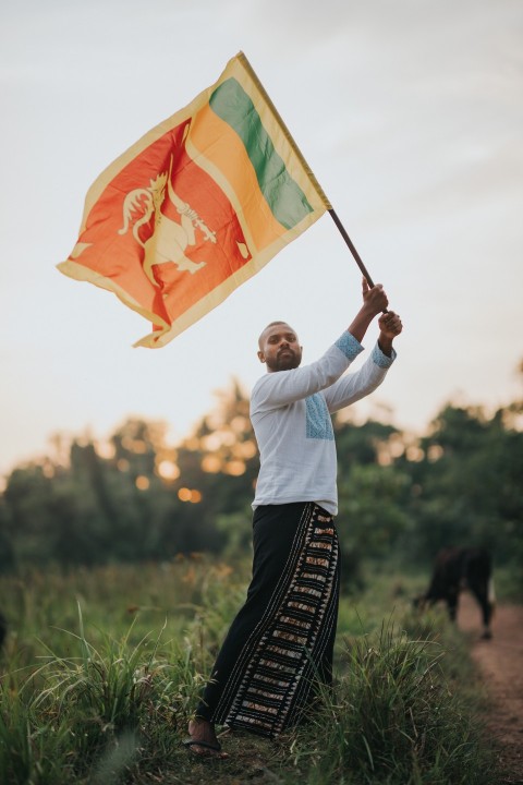 Man Waving Sri Lanka National Flag Sinha Kodiya Jathika Kodiya  (82)