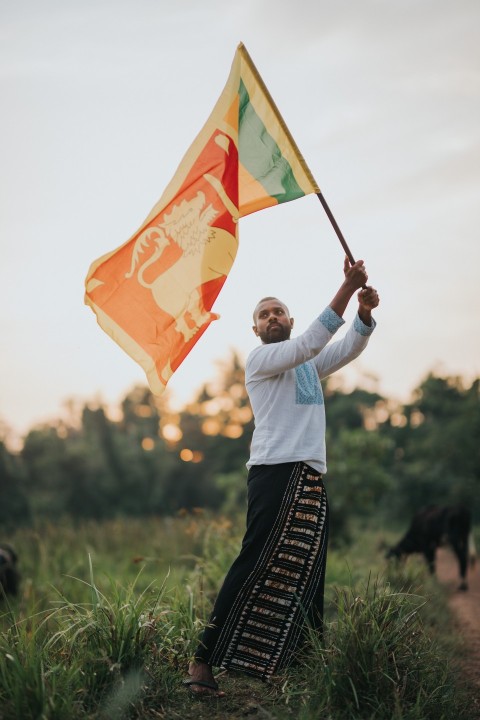 Man Waving Sri Lanka National Flag Sinha Kodiya Jathika Kodiya  (80)
