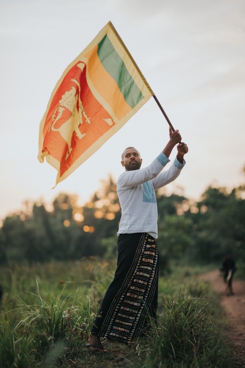 Man Waving Sri Lanka National Flag Sinha Kodiya Jathika Kodiya  (85)