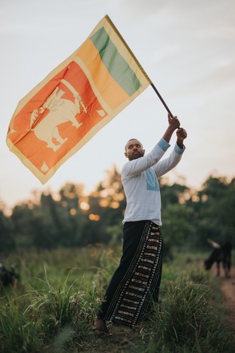 Man Waving Sri Lanka National Flag Sinha Kodiya Jathika Kodiya  (90)