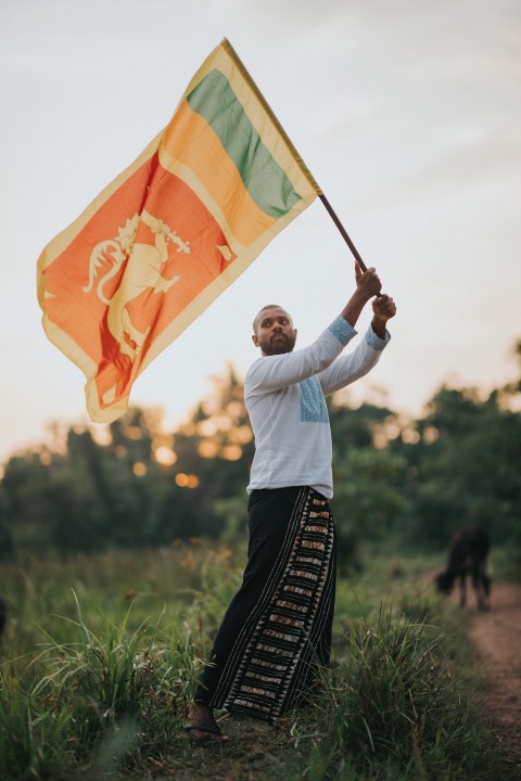 Man Waving Sri Lanka National Flag Sinha Kodiya Jathika Kodiya  (88)
