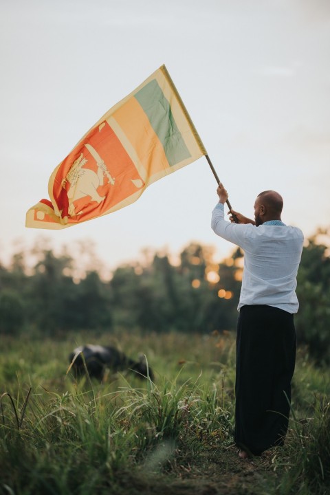 Man Waving Sri Lanka National Flag Sinha Kodiya Jathika Kodiya  (91)