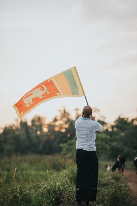 Man Waving Sri Lanka National Flag Sinha Kodiya Jathika Kodiya  (92)