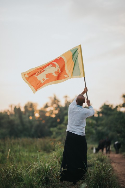 Man Waving Sri Lanka National Flag Sinha Kodiya Jathika Kodiya  (95)