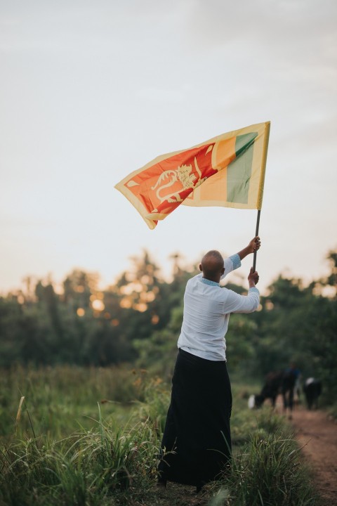 Man Waving Sri Lanka National Flag Sinha Kodiya Jathika Kodiya  (96)